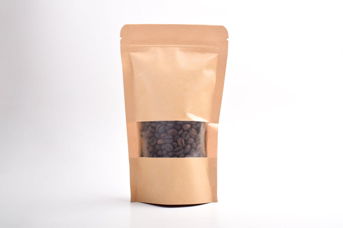 Kraft custom printed coffee bag with roasted beans