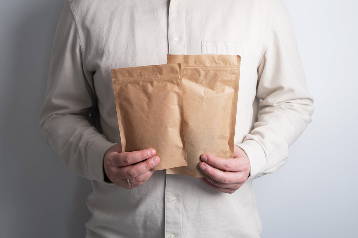 Coordinated kraft packaging system for a single brand