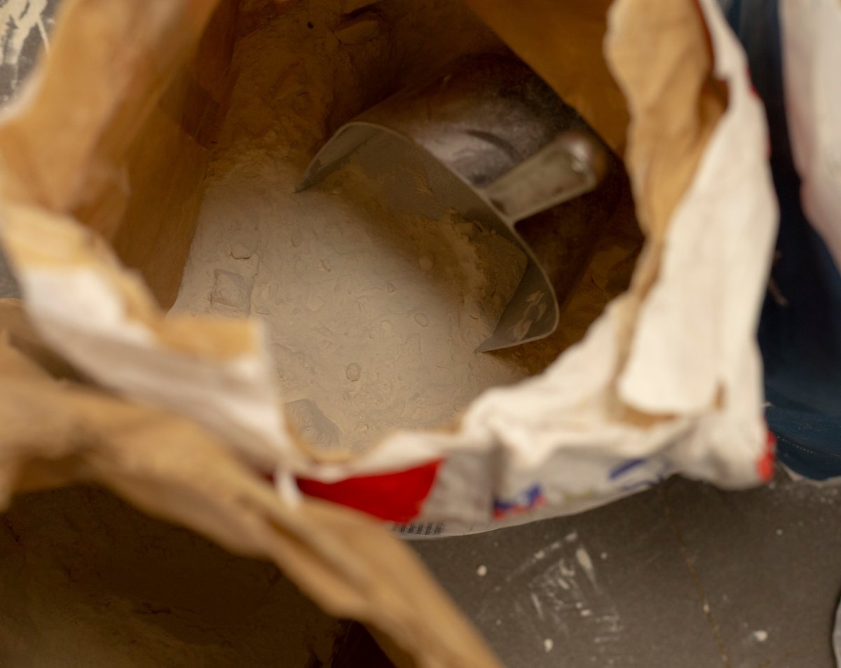 Open paper bakery bag showing the product inside